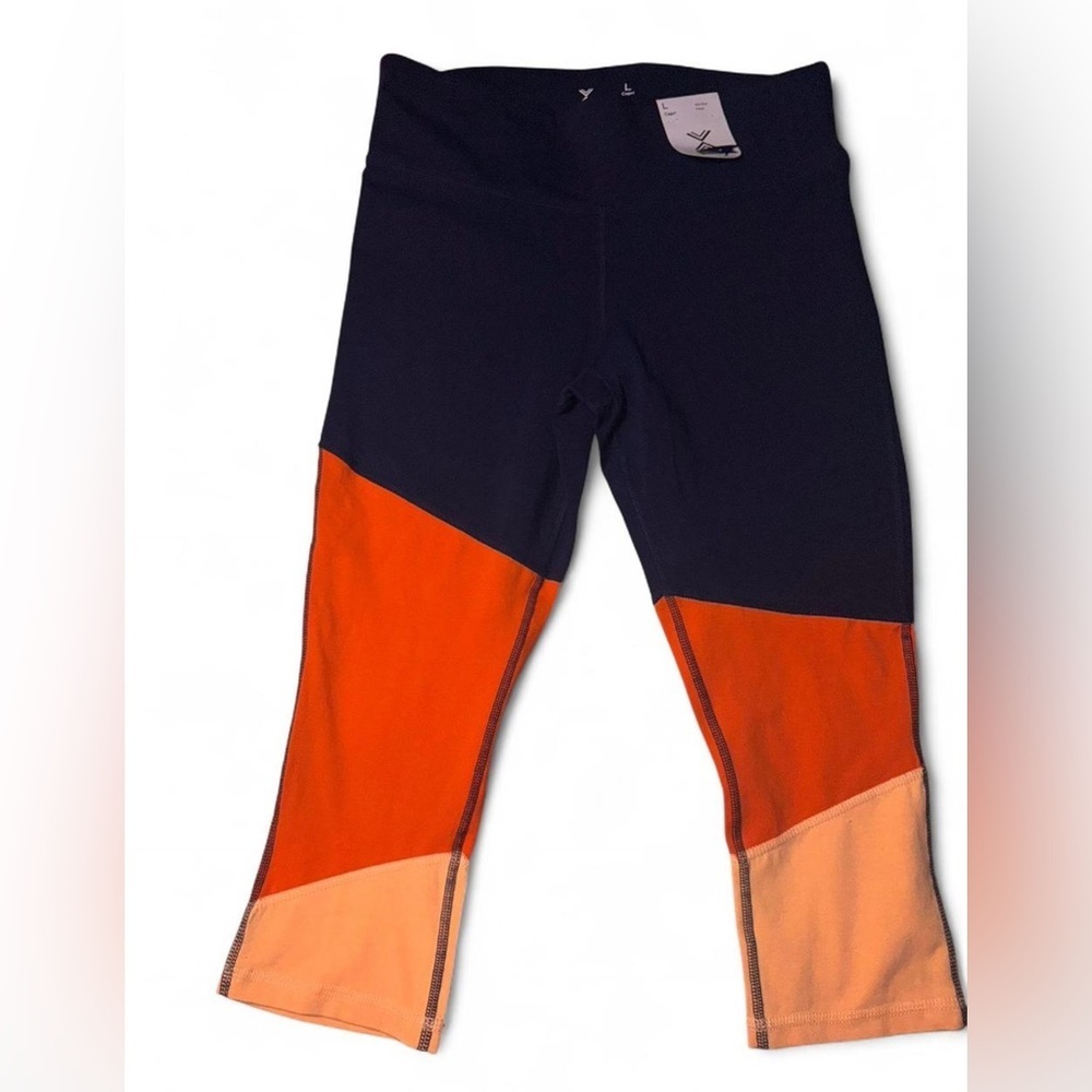 Xersion Women's Capri Leggings in Navy, Orange, and Peach